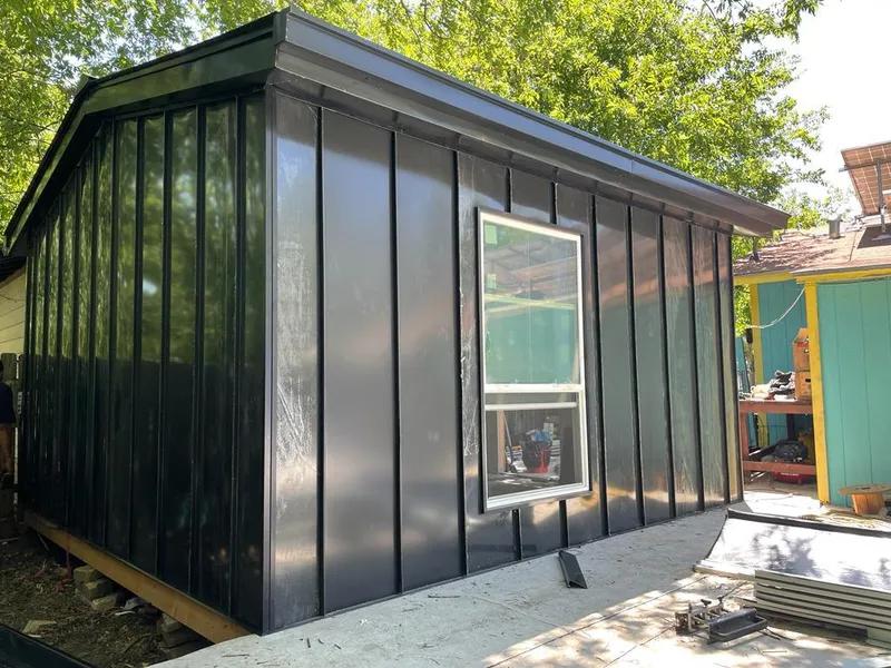 Black standing seam metal wall panels for Metal Roof Installation in Sturgeon Bay