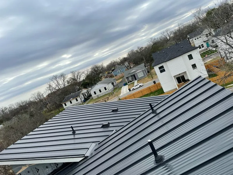 Standing seam metal roof panels with vents for Skylight Repair in Sturgeon Bay